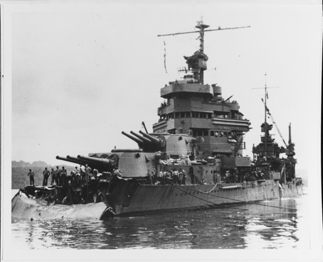 USS Minneapolis (CA-36) at Tulagi with torpedo damage received in the battle. Photograph was taken on 1 December 1942, as work began to cut away the wreckage of her bow. Official U.S. Navy Photograph, now in the collections of the National Archives.